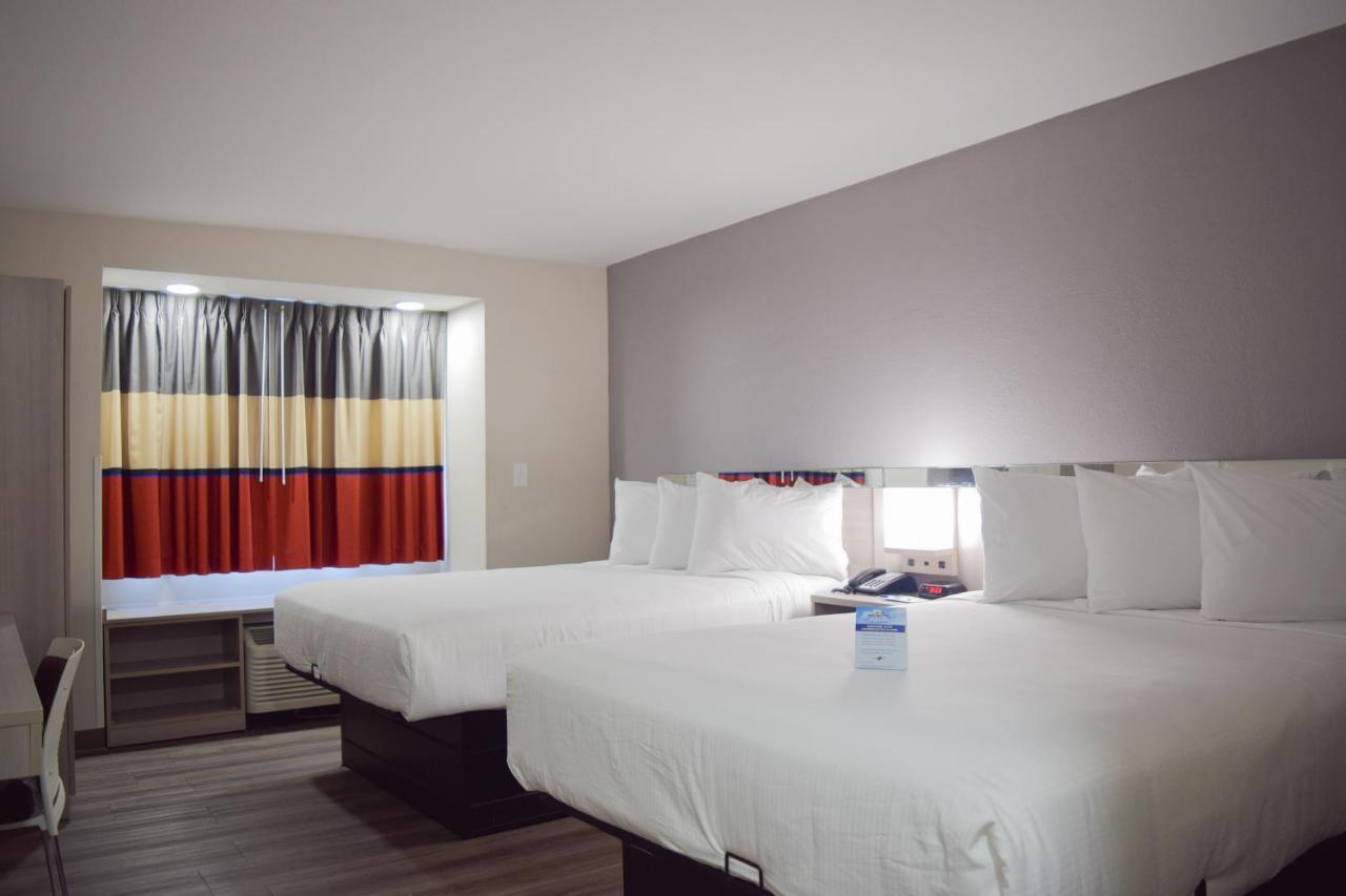 Travelers Inn And Suites ローリー エクステリア 写真