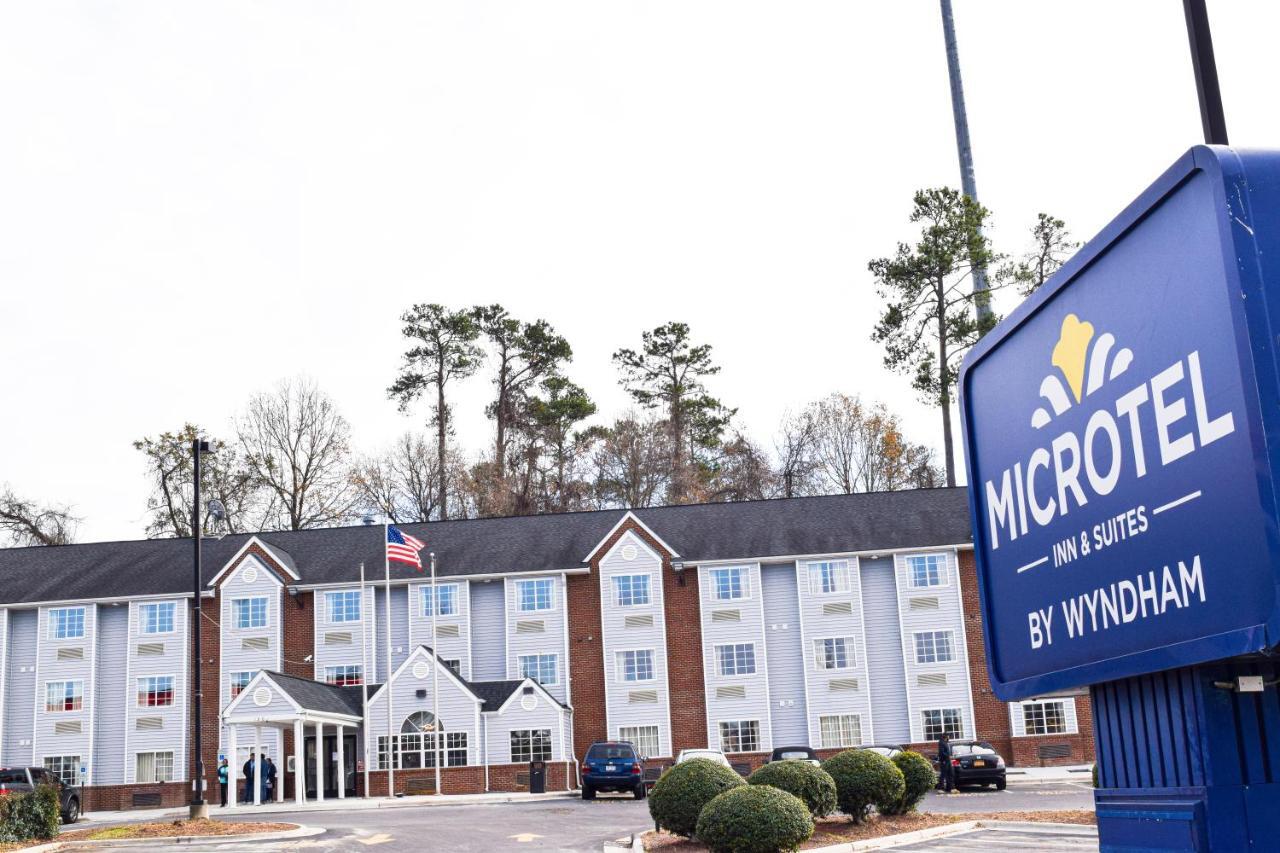 Travelers Inn And Suites ローリー エクステリア 写真